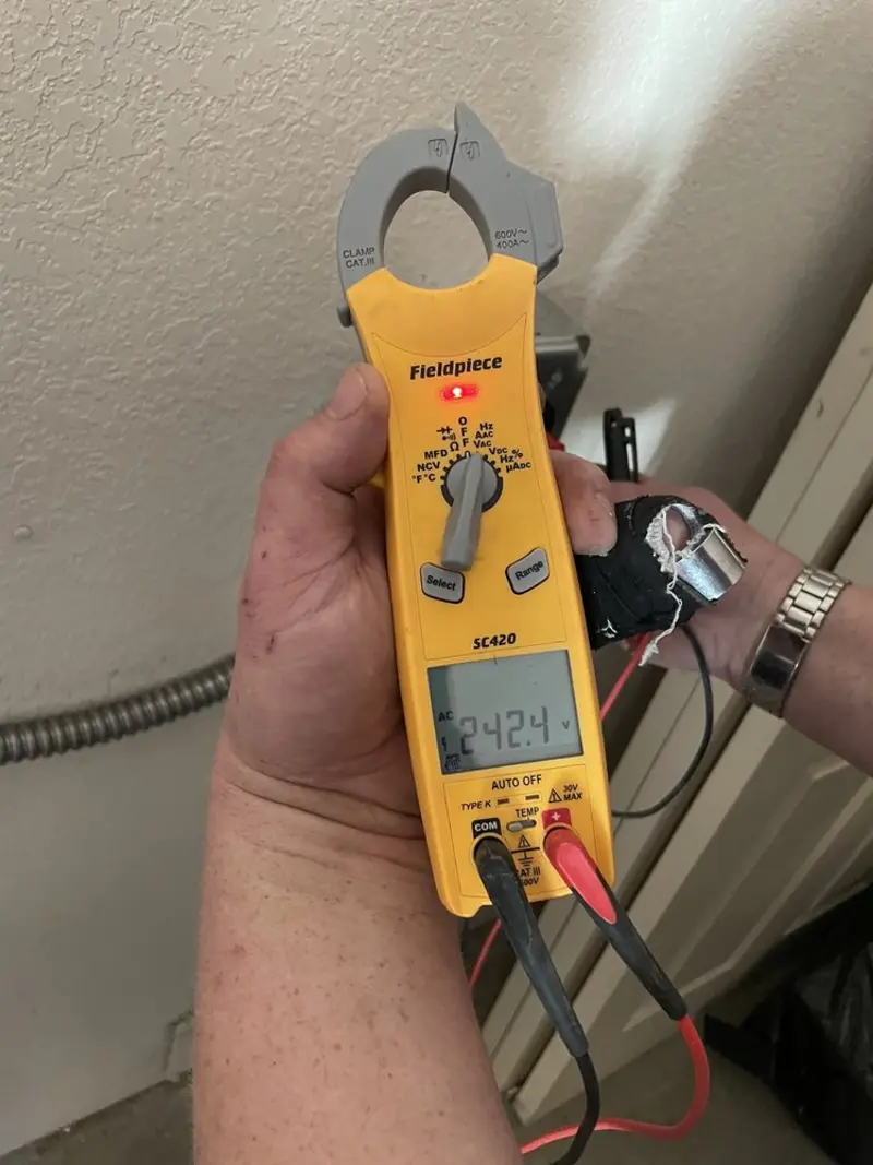 Voltage testing with clamp meter during Circuit Breaker Repair in Mount Lebanon